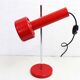 Red metal articulated desk lamp
