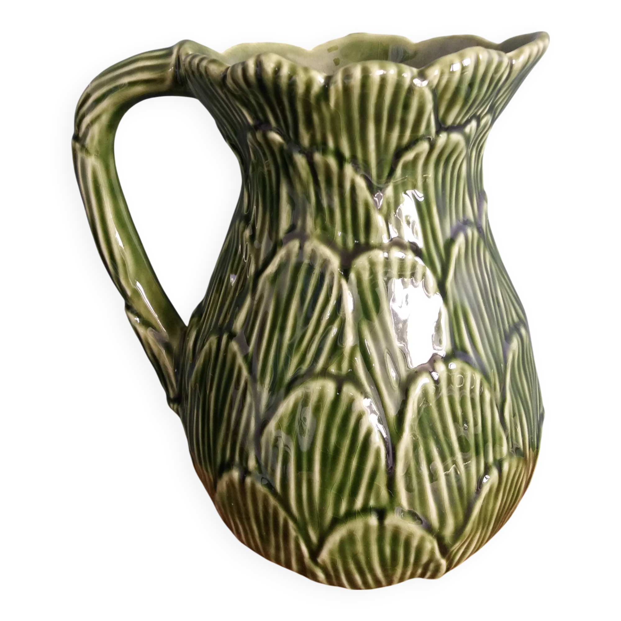 Cabbage pitcher in slip