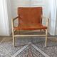 Havana armchair in teak and cowhide leather