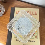 Old small square wall light ceiling fixture with transparent vintage glass.