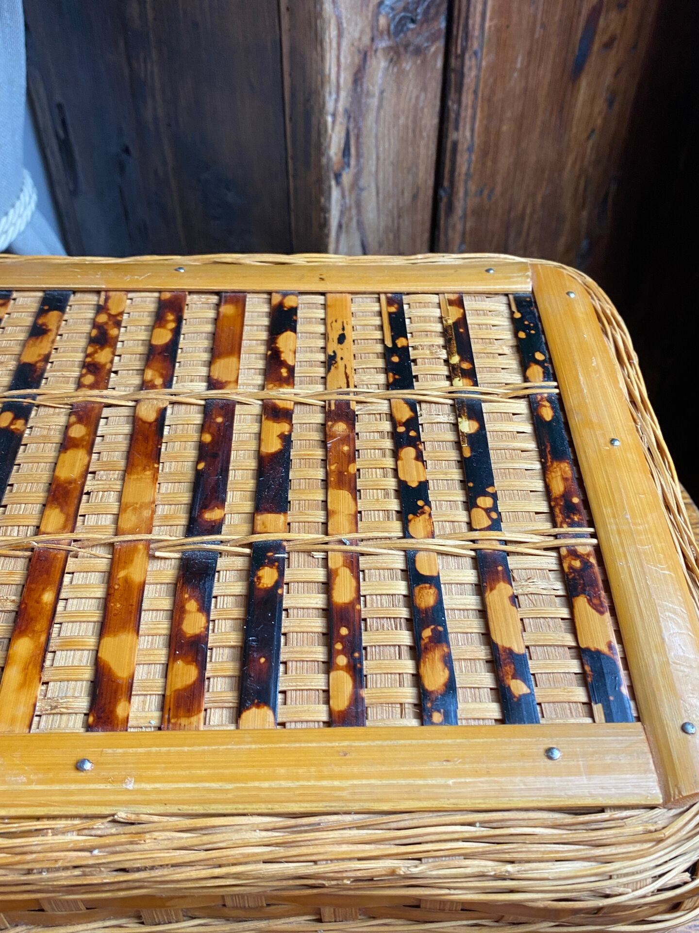 Wicker and wood suitcase