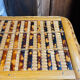 Wicker and wood suitcase