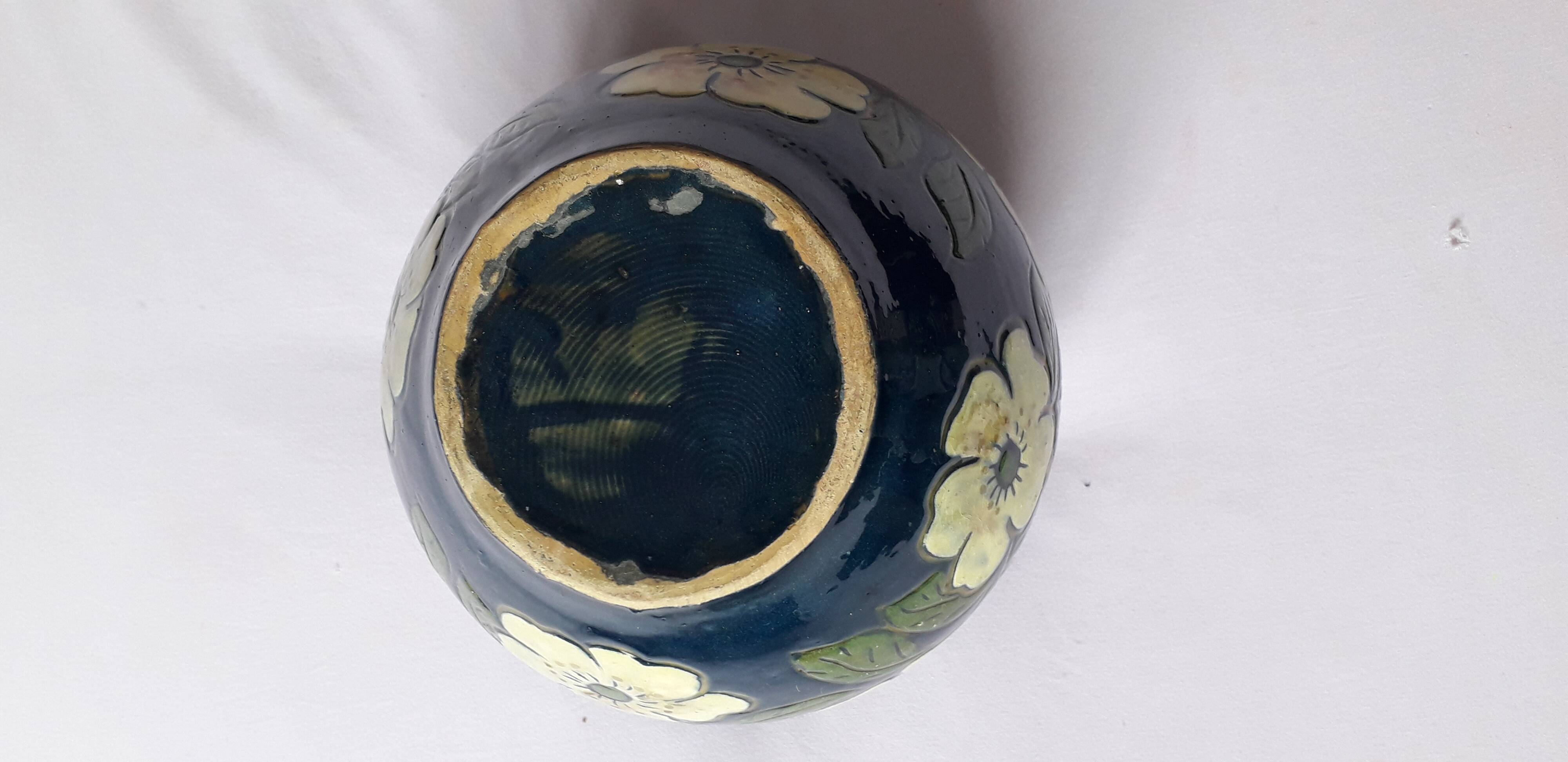 Antique Art Nouveau vase with floral decoration.