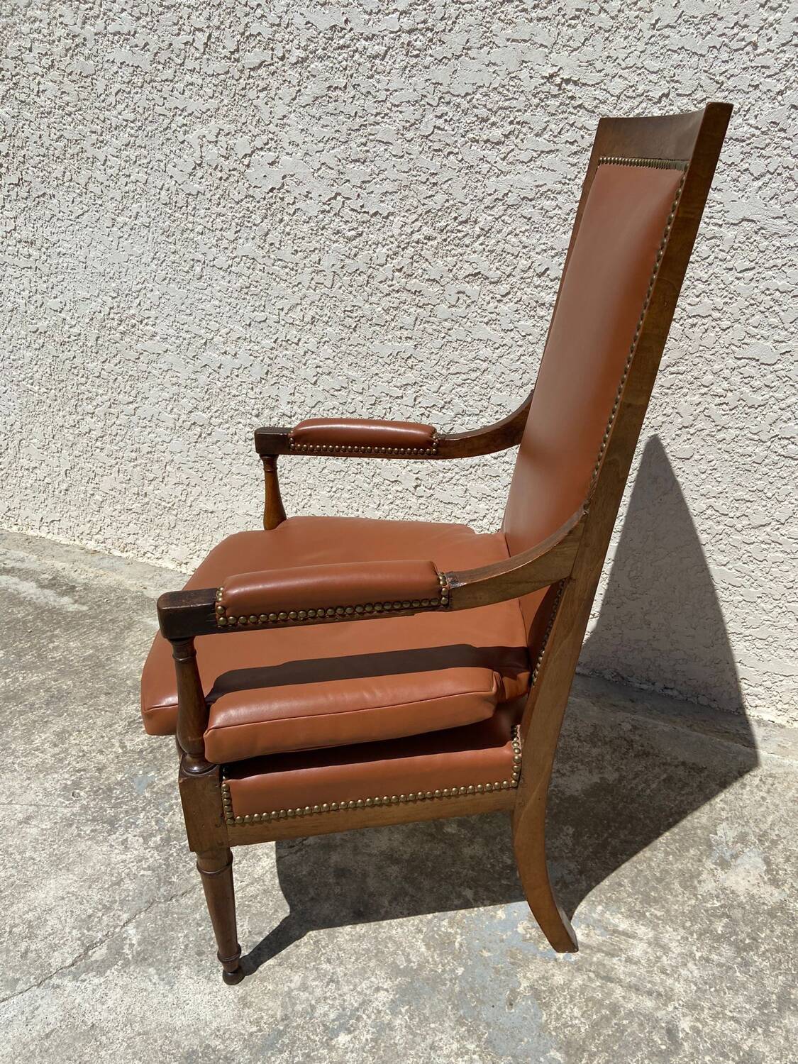 Wooden and leather armchair