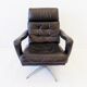 Danish black leather armchair with ottoman 70s