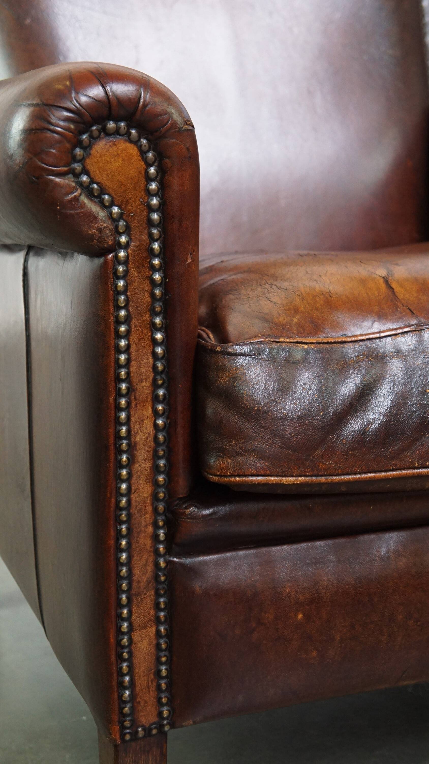 Vintage sheepskin armchair with beautiful warm colors and excellent seating comfort