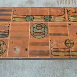 Table basse vintage en céramique – motif drakkar – design années 70