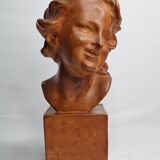 Bust of a laughing child in patinated plaster, 35 cm