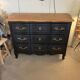 Black and wood chest of drawers
