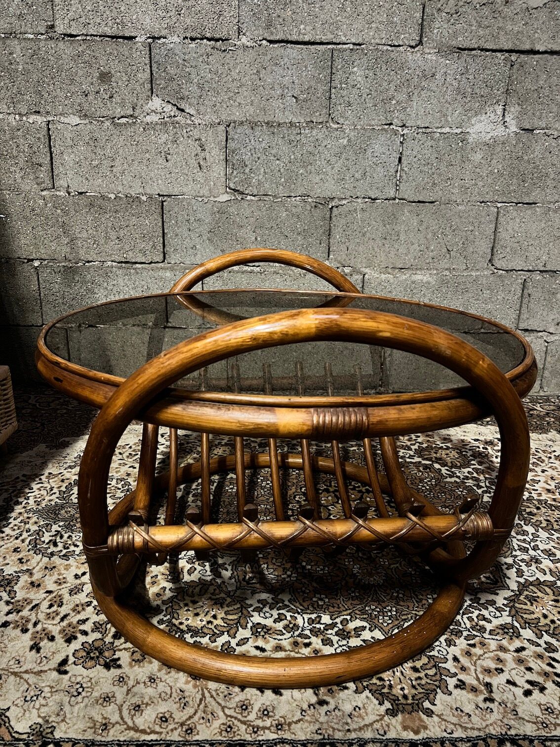 Vintage round coffee table in rattan and smoked glass