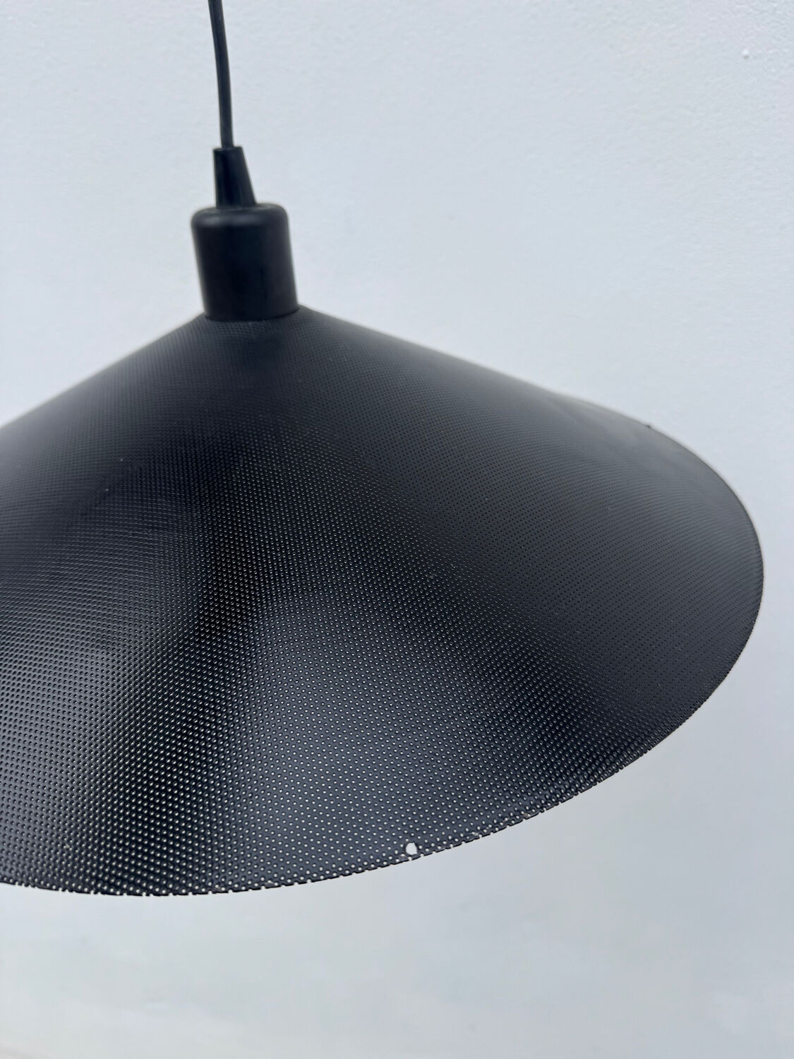 Metal micro-perforated suspension from the 1960s.