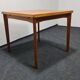 Teak Danish design dinning table by Henning Kjaernulf