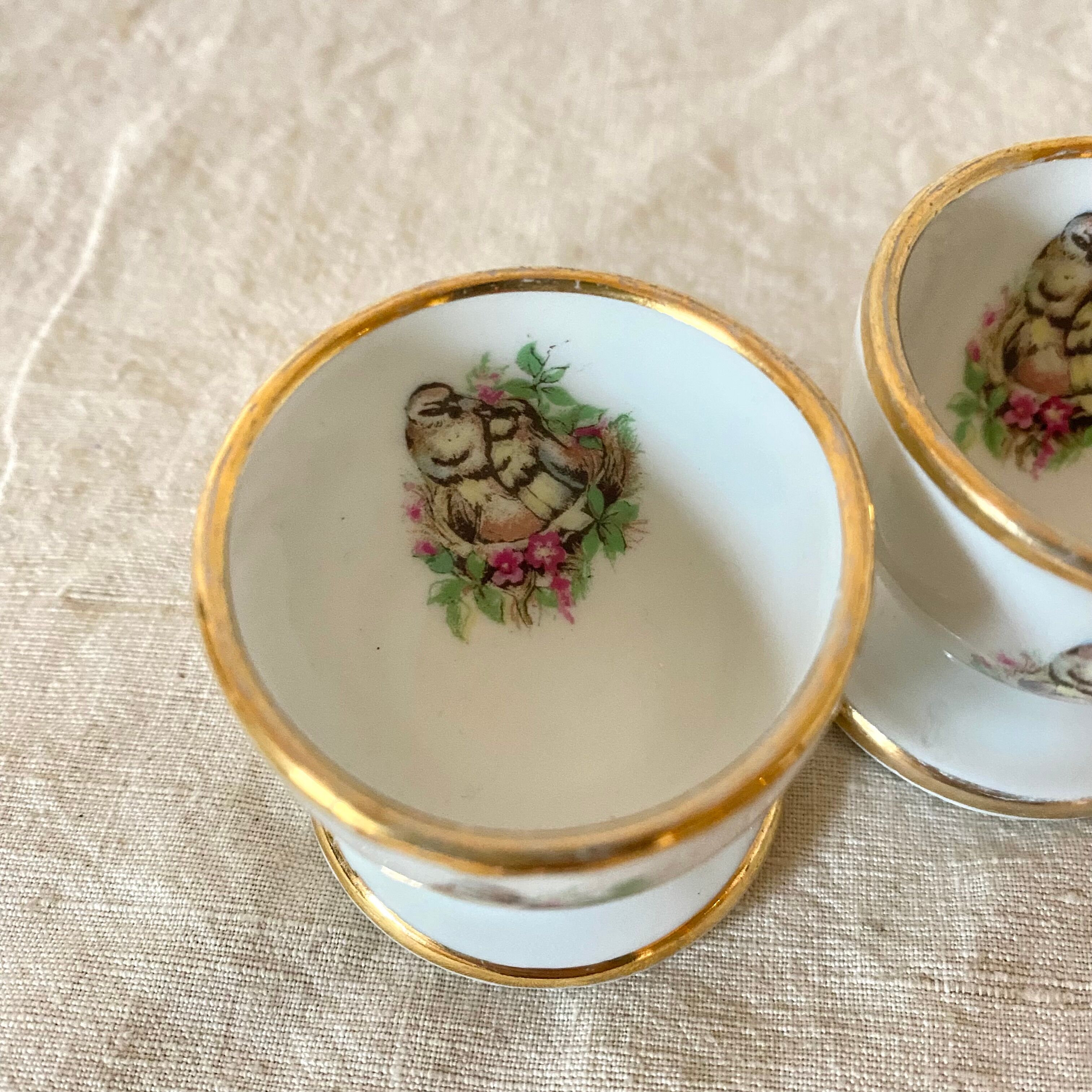 2 porcelain shells birds