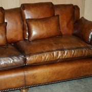 Pair of Ralph Lauren Jamaica club sofas restored in leather.