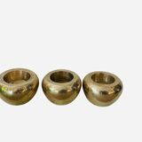 Three brass candlesticks