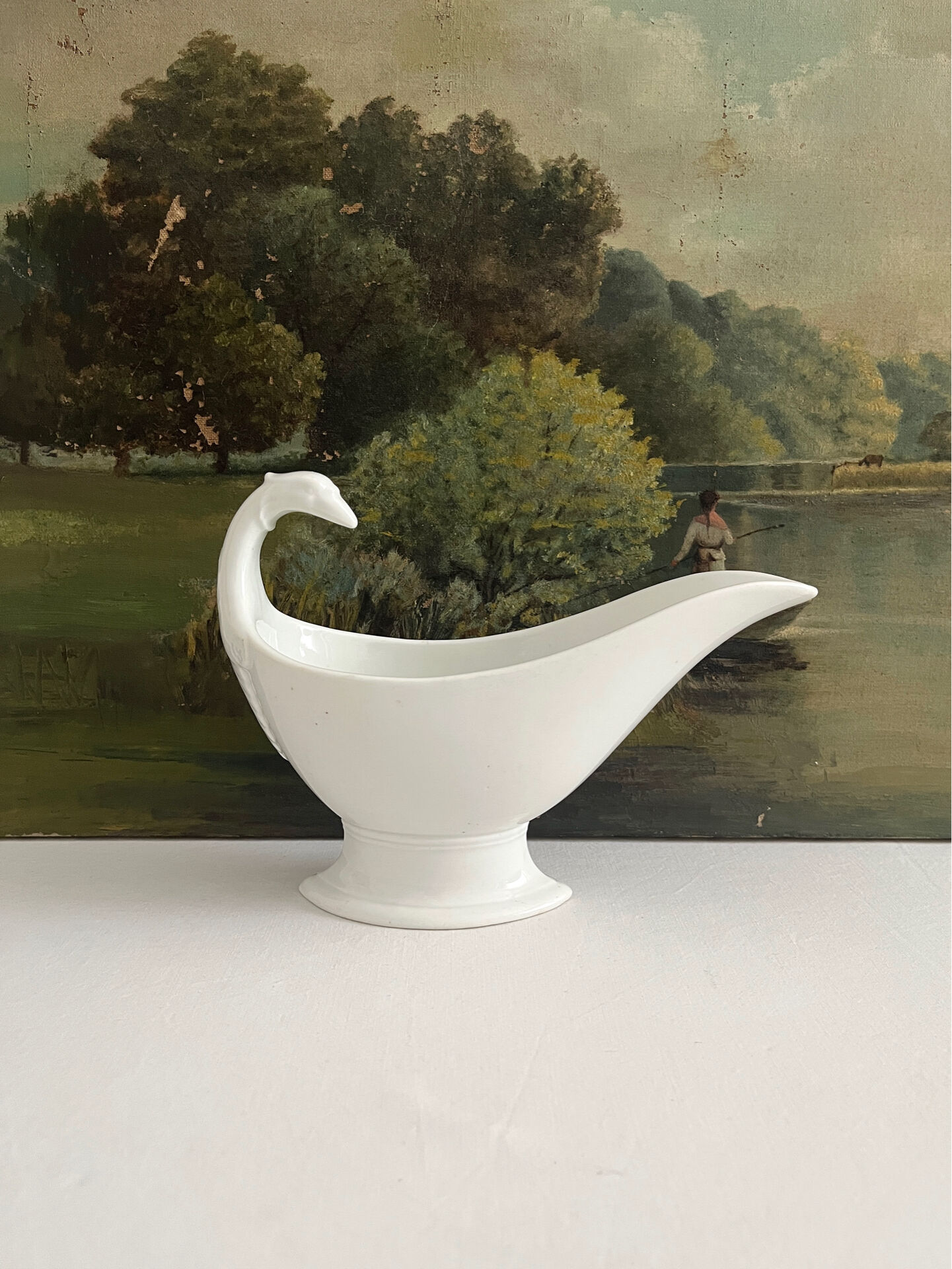 Empire sauce boat with eagle head in antique porcelain