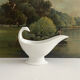 Empire sauce boat with eagle head in antique porcelain