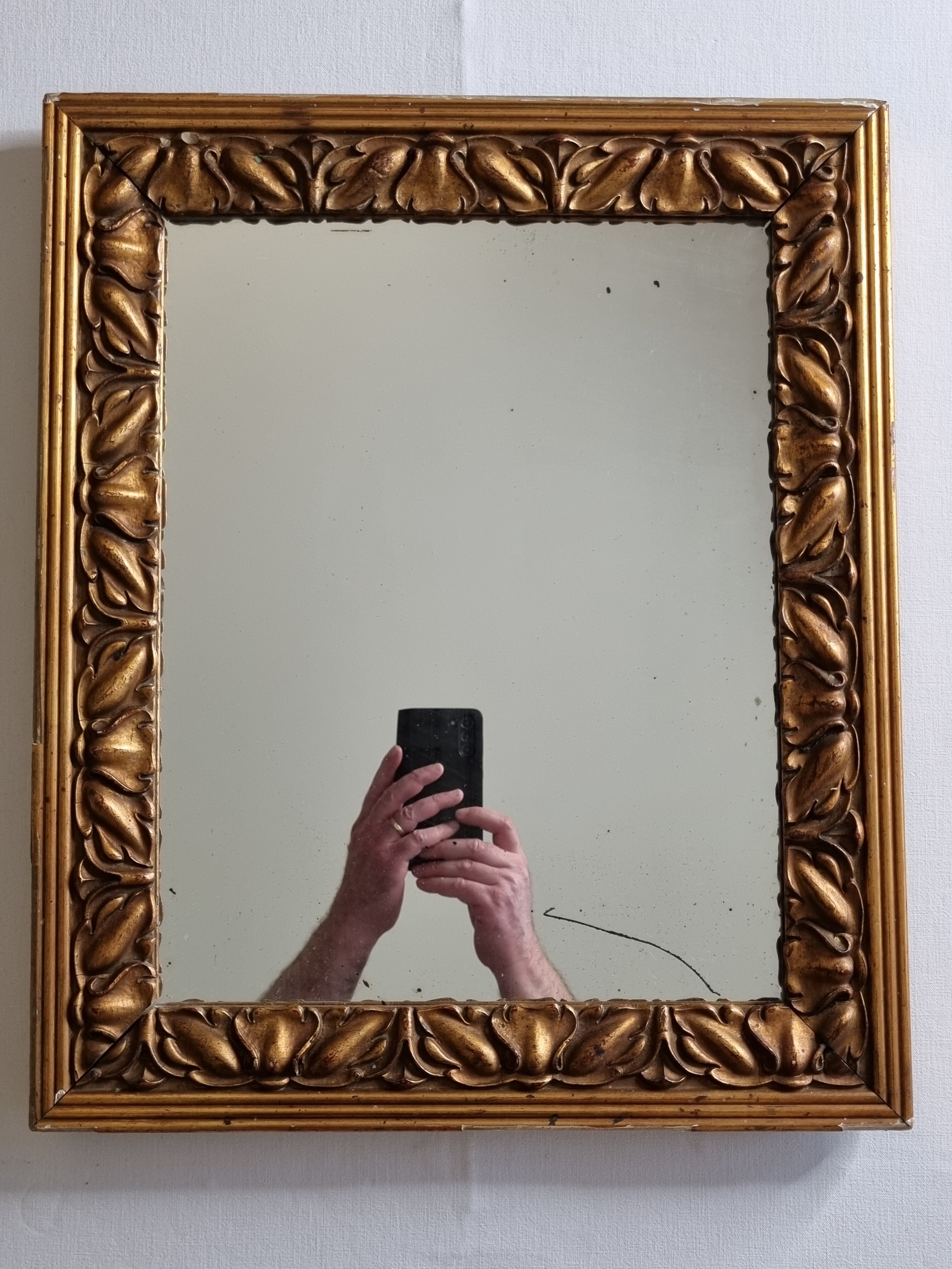 Patinated golden rectangular mirror, decorated with acanthus leaves, 49 cm