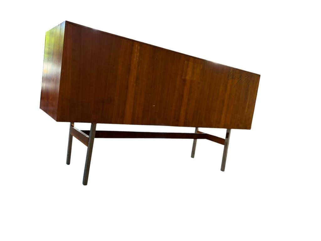 Vintage wooden storage cabinet with chrome legs