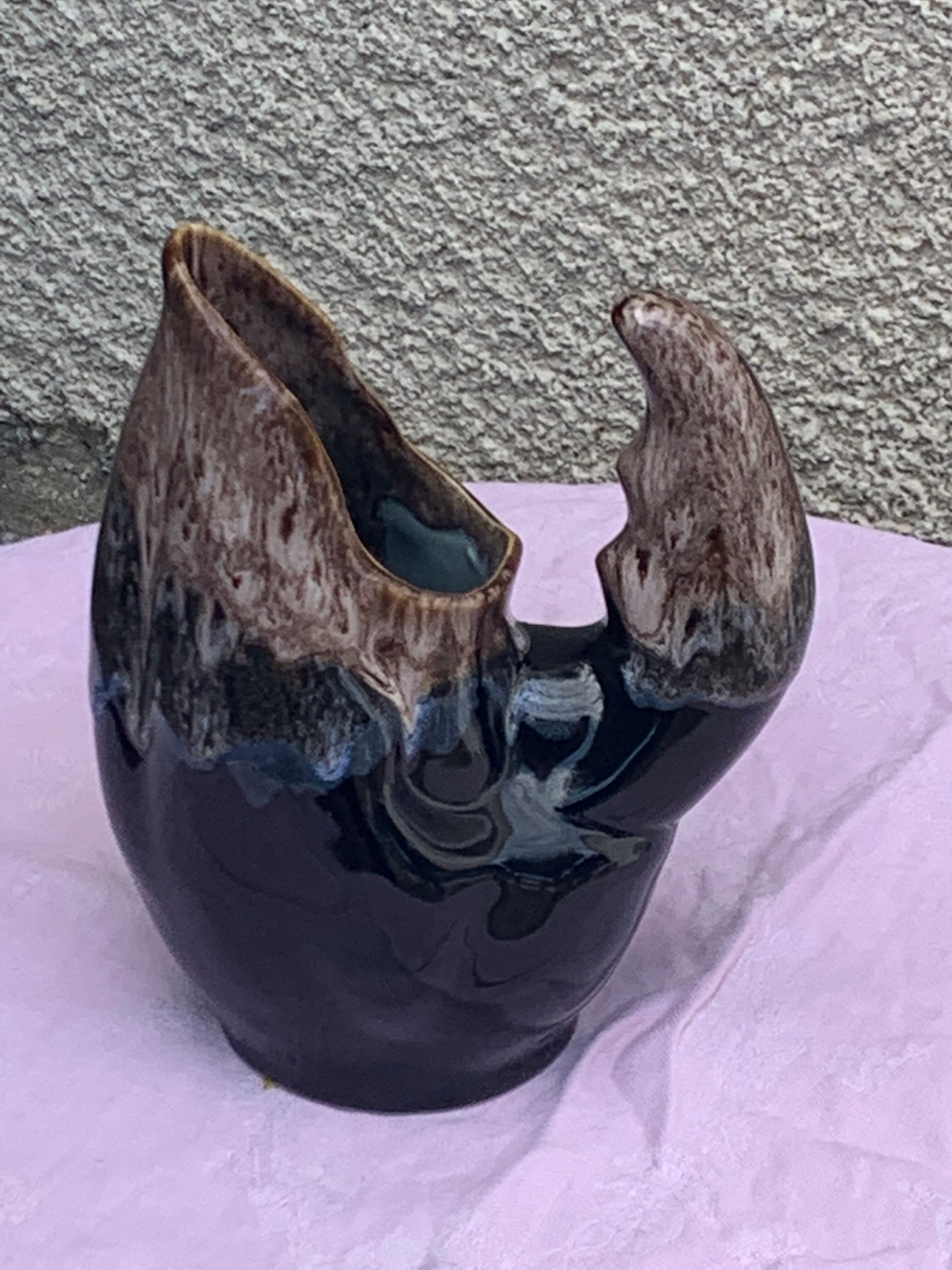 Vintage and numbered glazed ceramic decanter