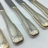 12 silver metal knives.