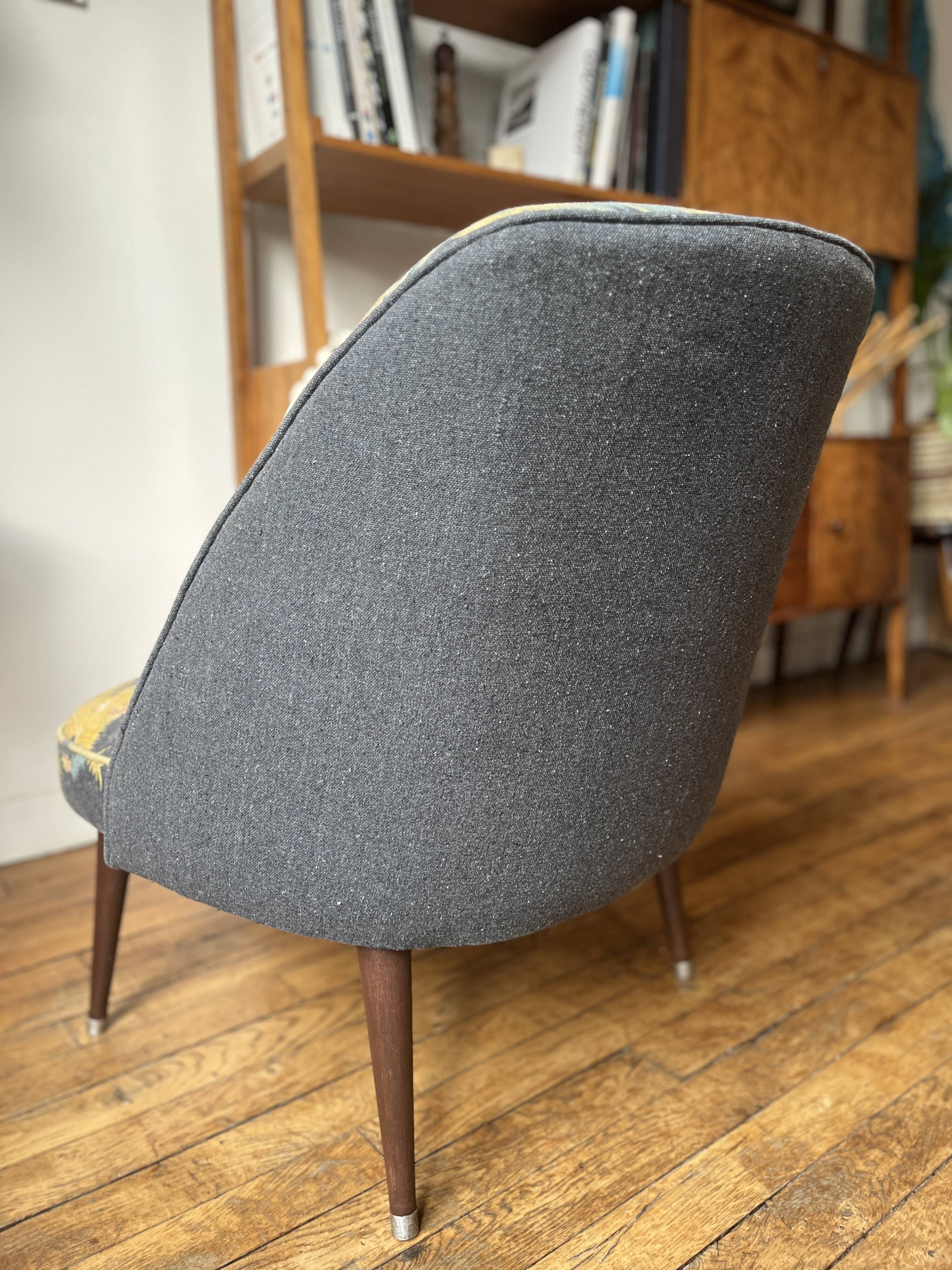 J. Tenreiro, Brazil. Concha armchair with tapered legs, Cluny tapestry 1400.