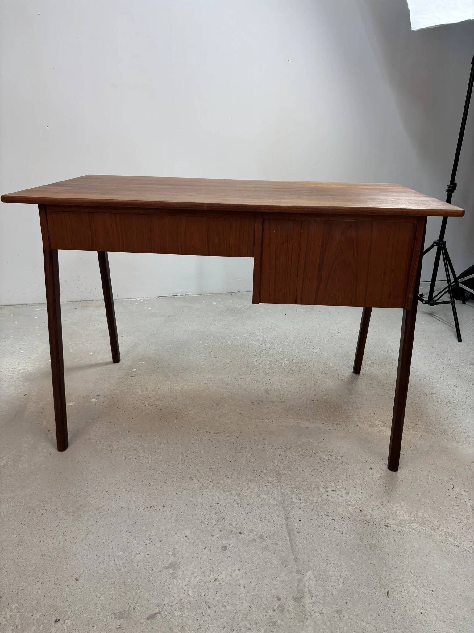 Flat desk in teak with three drawers, Scandinavian work from the 1950s-70s.