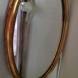 Miroir médaillon en bois doré - 43x24cm