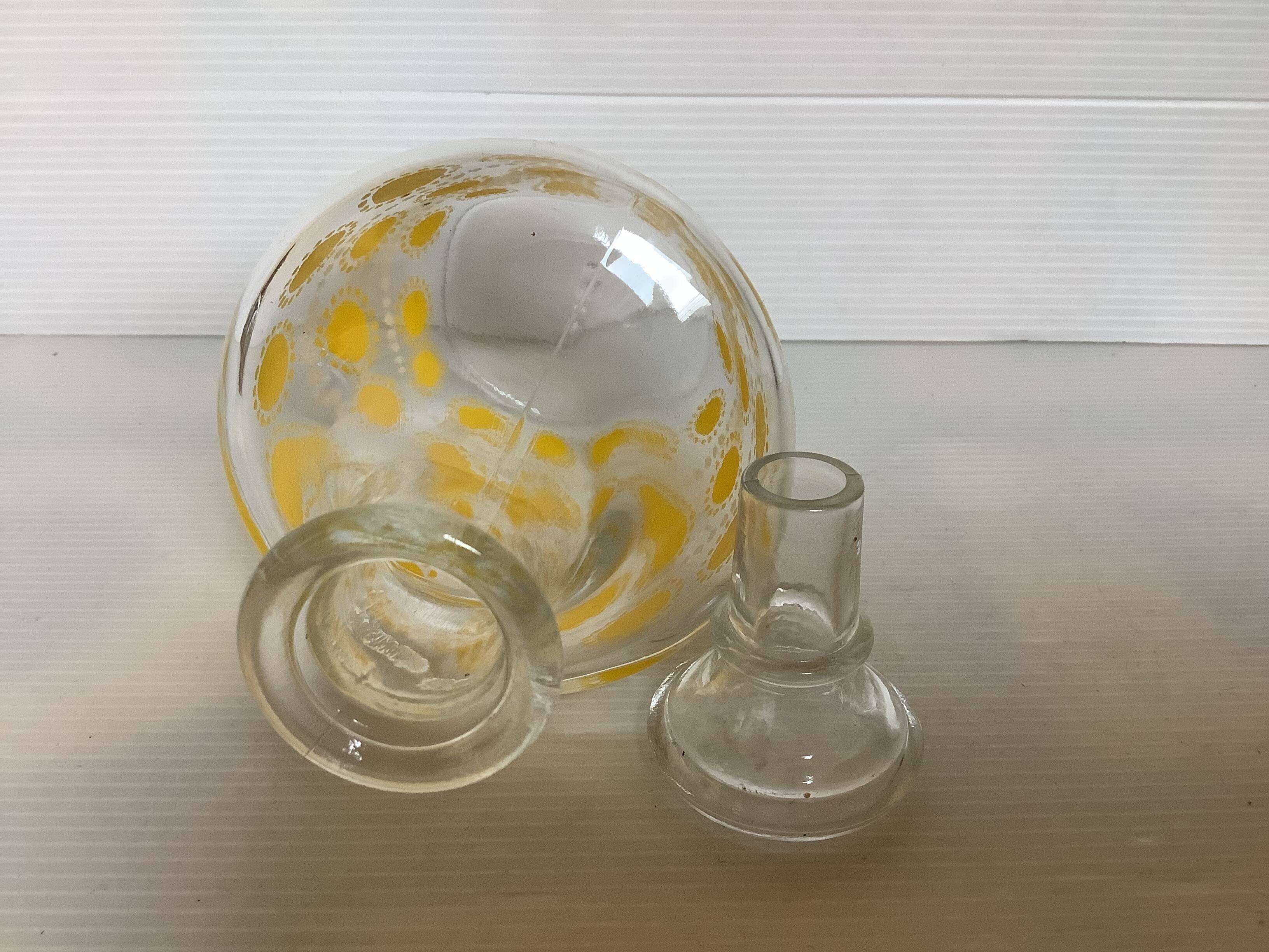 Liqueur service with multicoloured polka dot patterns.