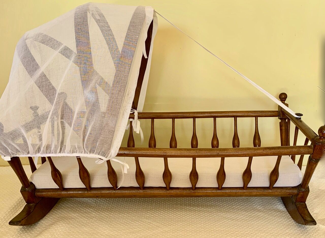 19th century wooden rocking cradle