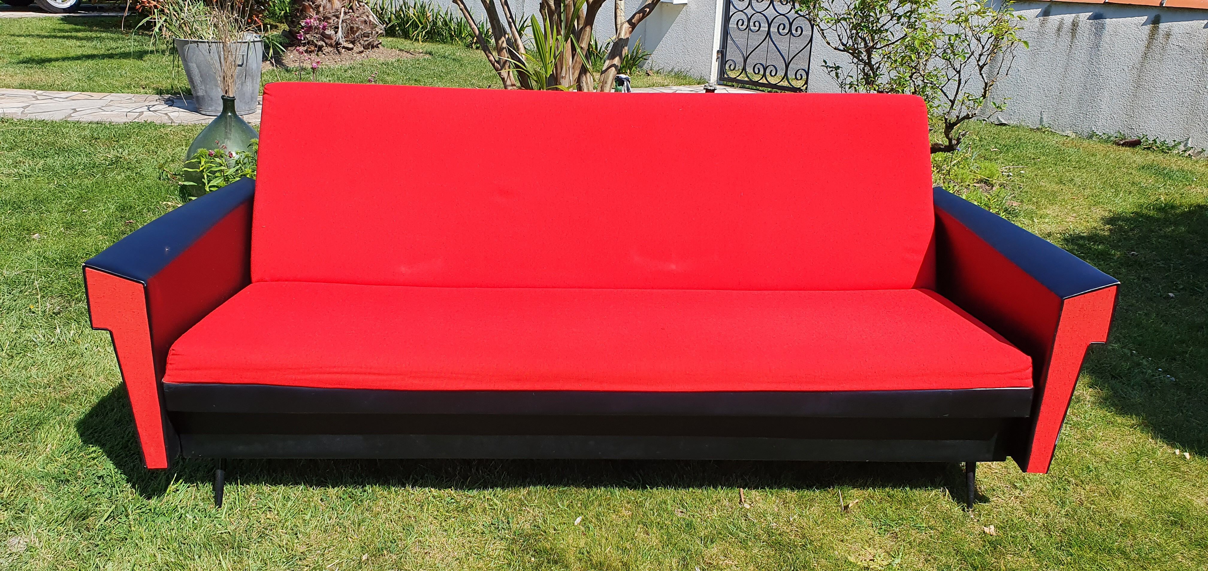 Vintage sofa 3 places convertible, red fabric and black skaï.1960s.