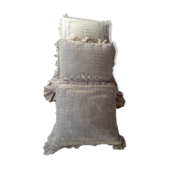 3 old cushions finely embroidered in silk, 1900s