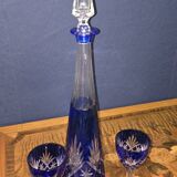 Cobalt blue double crystal service, consisting of a decanter and two matching glasses.