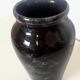 Marbled black faience vase