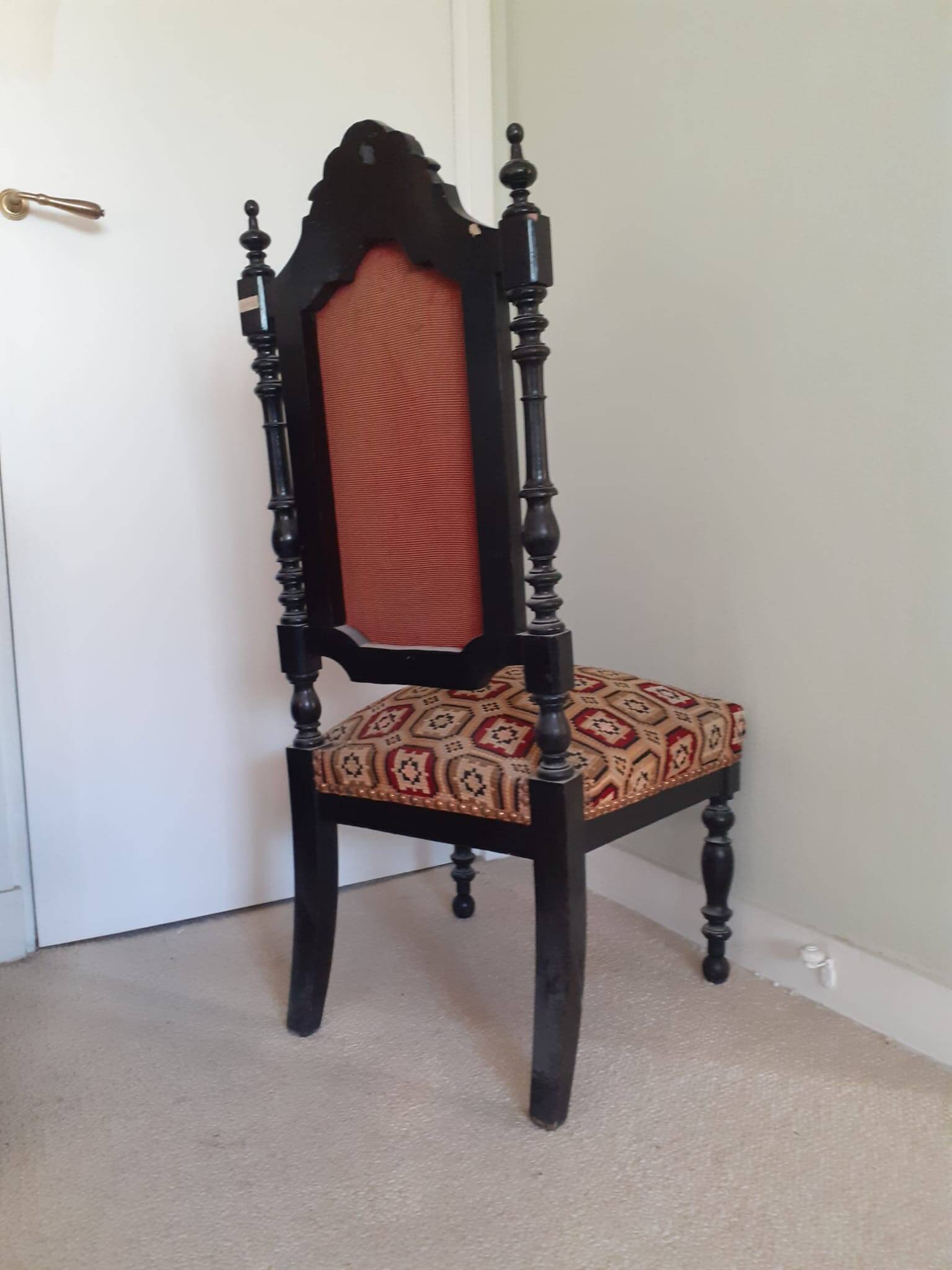 Antique black wooden chair