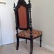 Antique black wooden chair