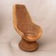 Fauteuil vintage en osier tressé