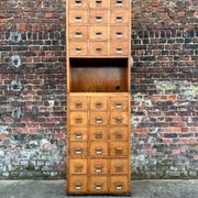 Large vintage workshop furniture with 30 drawers, antique haberdashery compartments.