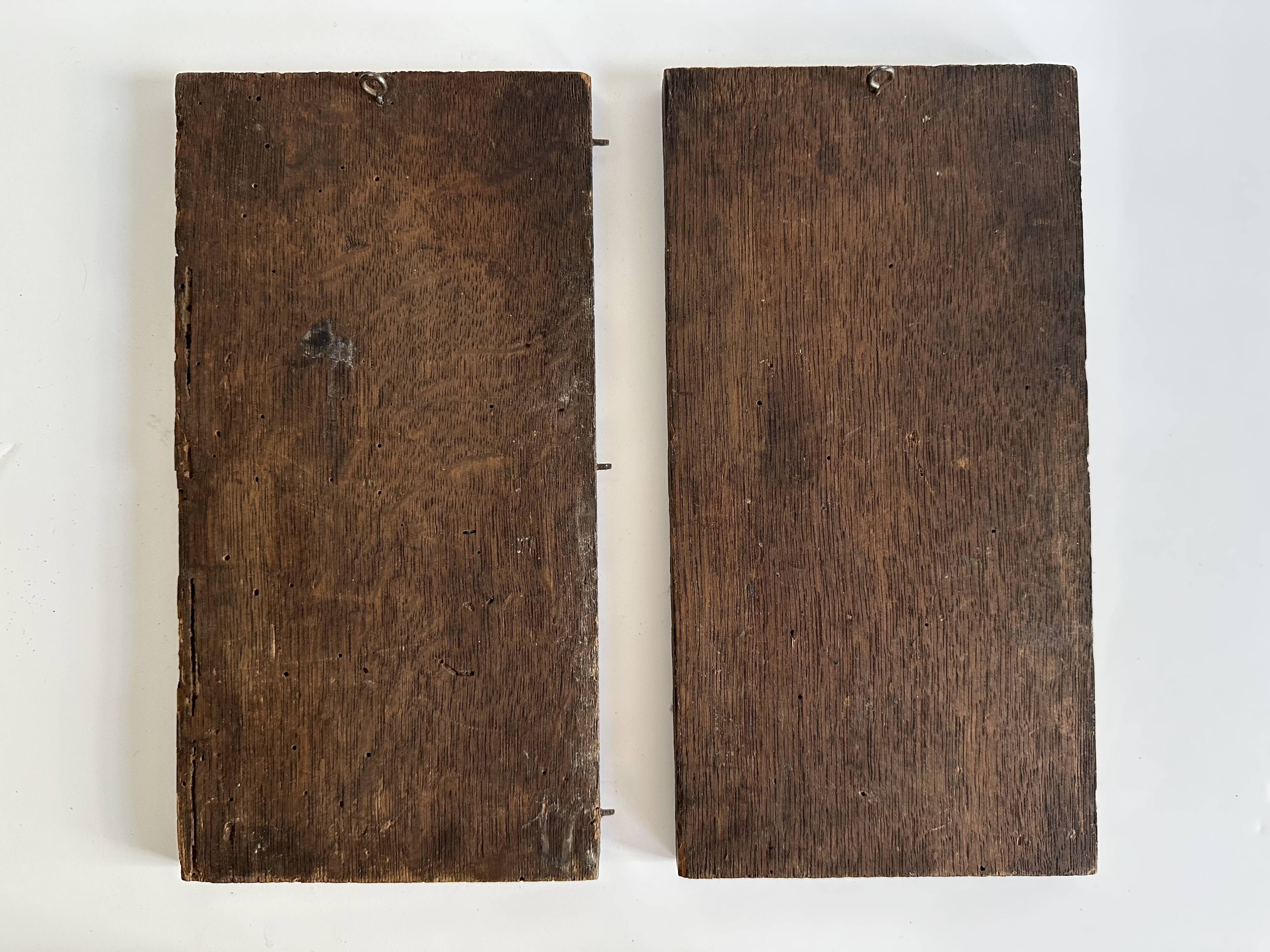 Pair of antique decorative panels in carved wood, 19th century