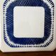 Vintage old trivet Badonviller blue graphic pattern