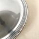 Vintage tiered display stand, stainless steel rotating server Alessi Fratelli