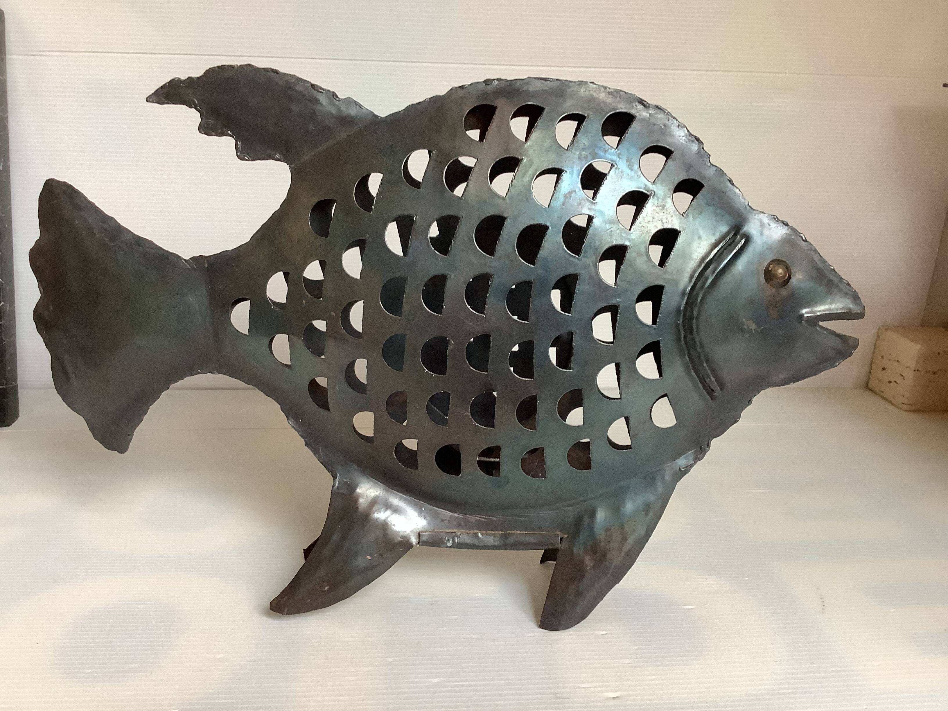 Large metal fish-shaped candle holder