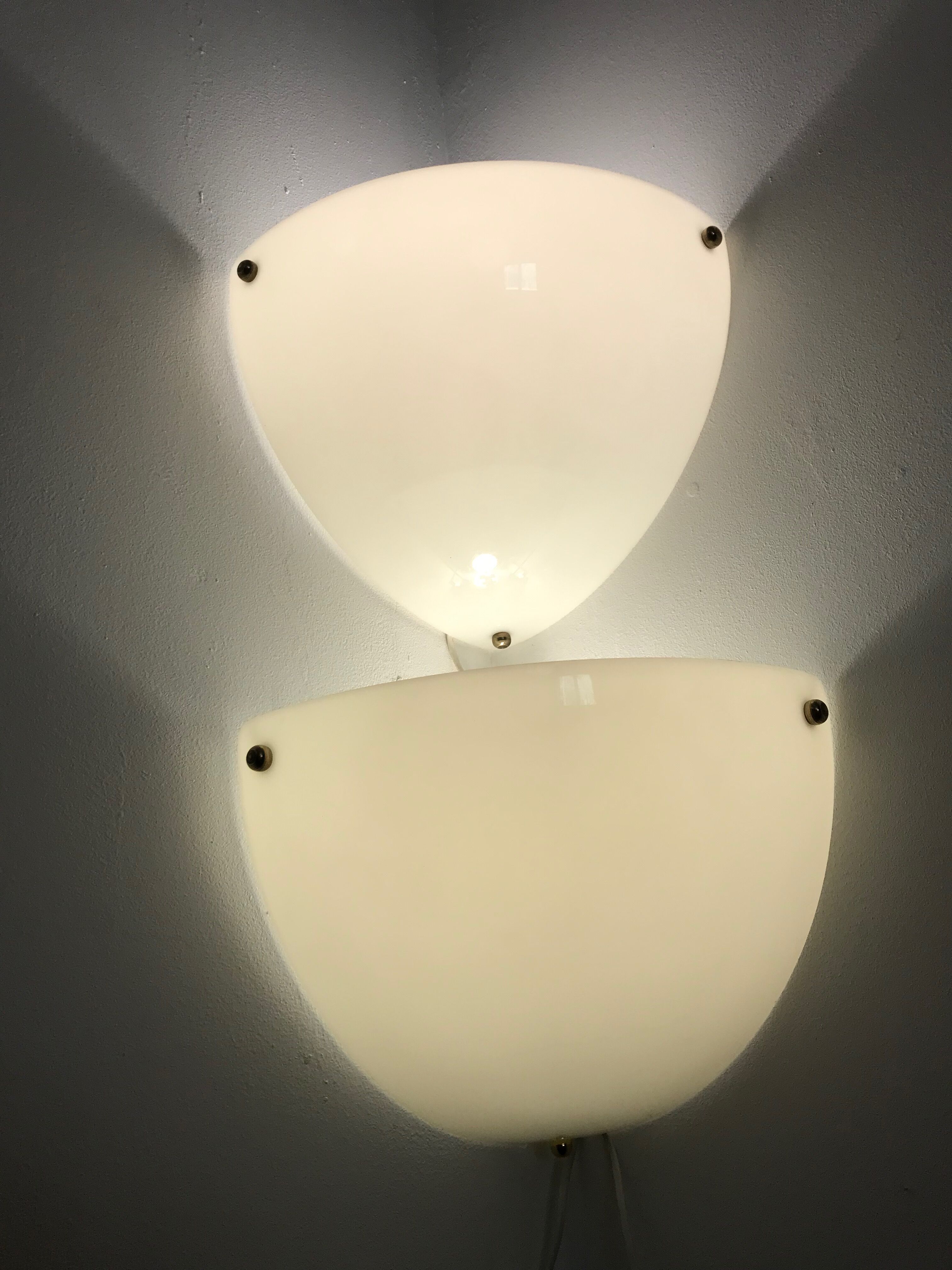 Duo of plastic corner sconces