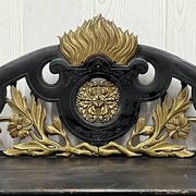 Blackened wooden shelf.