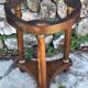 Empire style mahogany and mahogany veneer tripod pedestal table