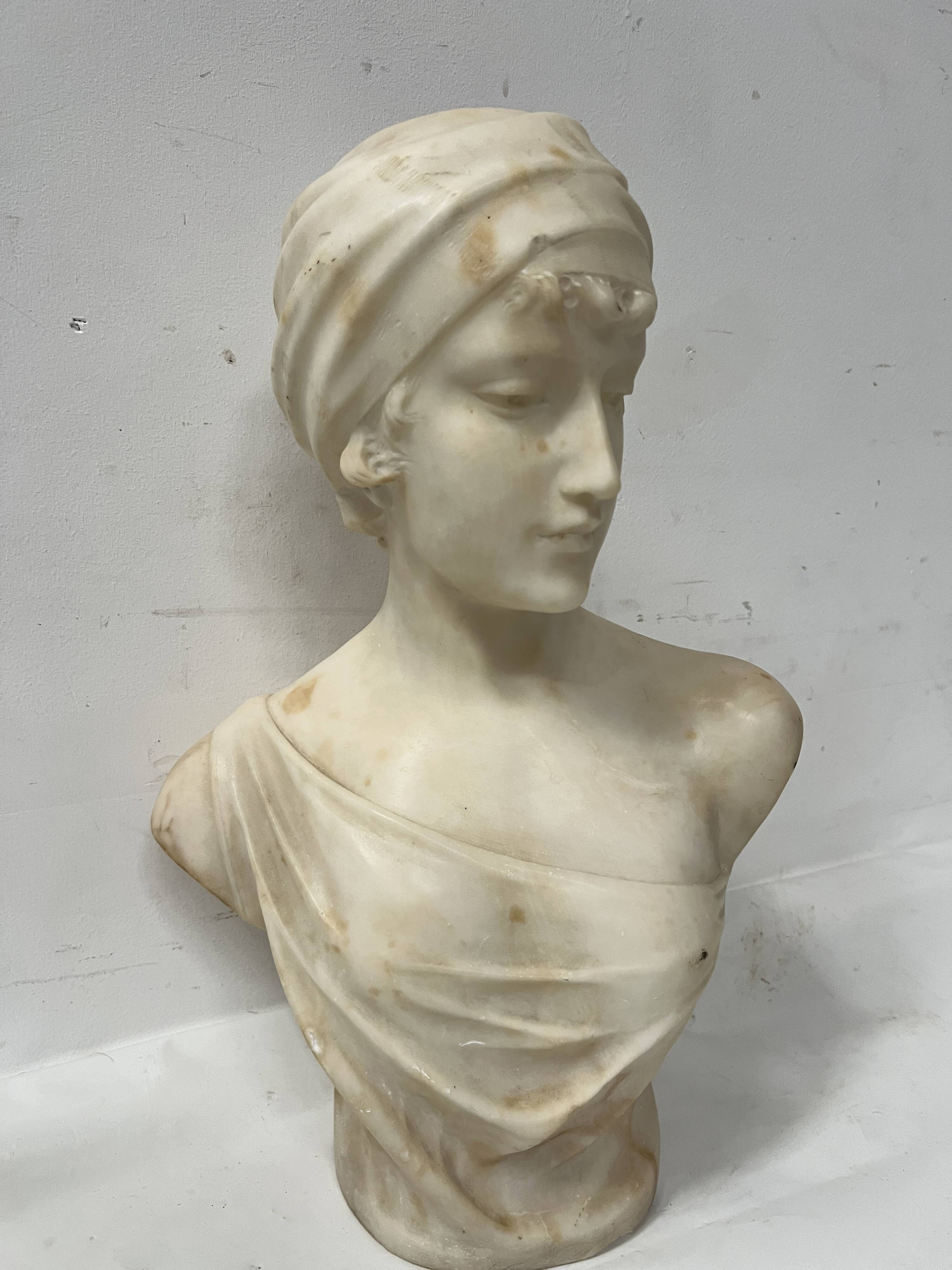 Sculpted marble group of a young woman's bust, 20th century.