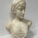 Sculpted marble group of a young woman's bust, 20th century.