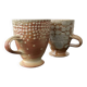 Set of 2 enamelled stoneware mugs with stylised polka dots.