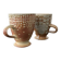 Set of 2 enamelled stoneware mugs with stylised polka dots.