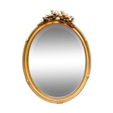Bevelled oval mirror in vintage gilded wood 46x62cm